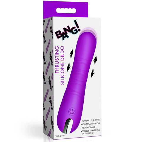 Purple silicone dildo with packaging featuring 'BANG!' branding on a white background